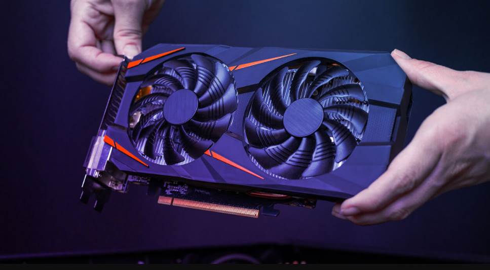 Image of a person holding a gpu