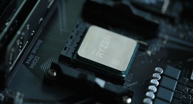 Image of AMD Ryzen CPU connected to a motherboard