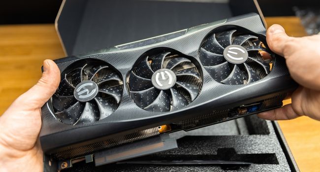 person holding evga rtx 3080